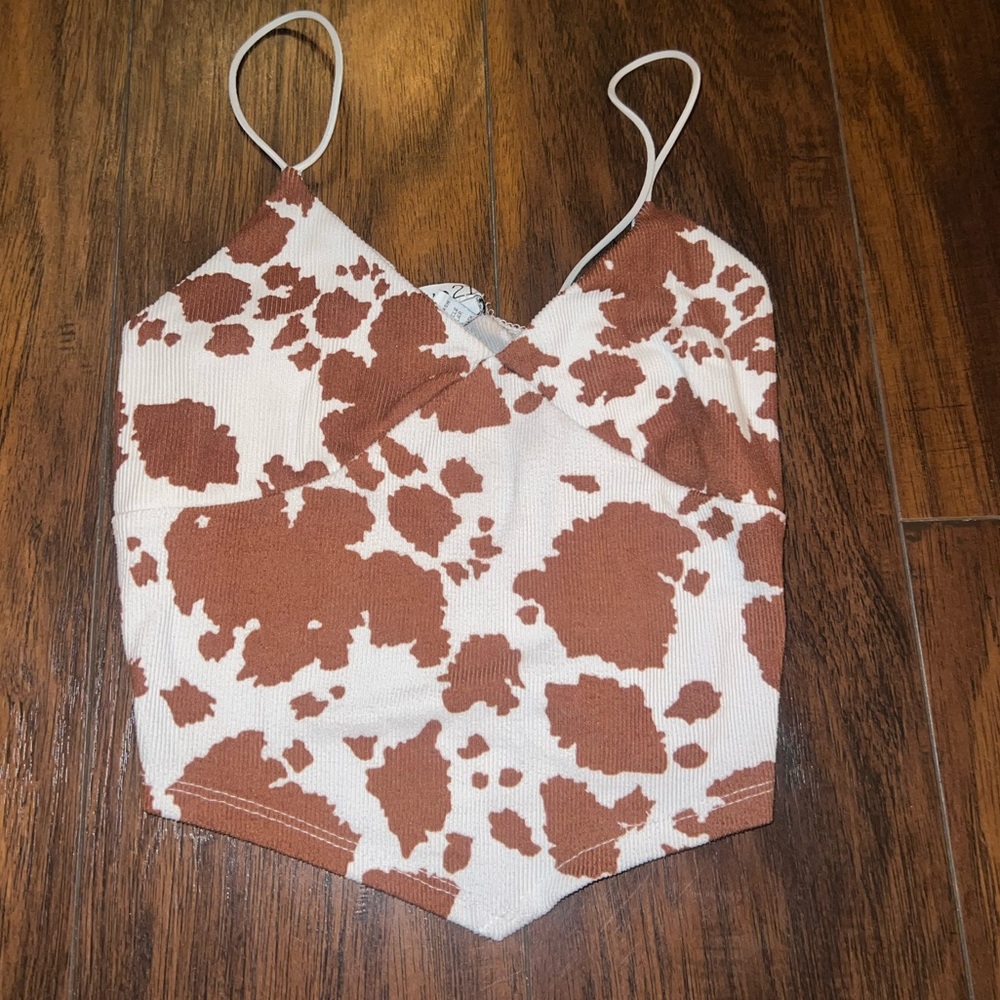 This super cute cowgirl inspired cropped top is from rue21!!